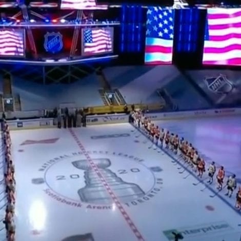 STANDING PROUD: NHL Players Stand Together in Solidarity During Performance of US National Anthem