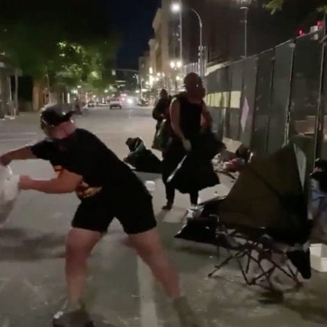 PORTLAND MAYHEM: Protesters Dump Bags of Garbage, Trash Over Fence Protecting Federal Property