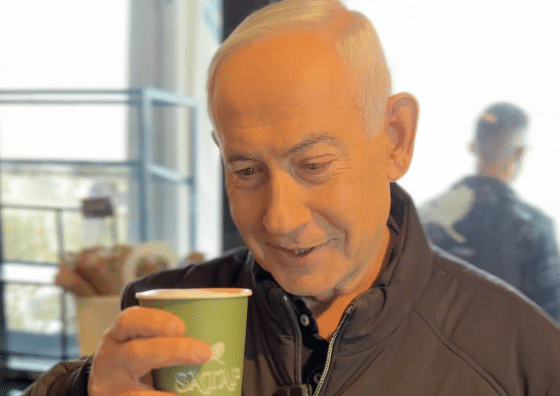 ‘THEY SAY I’M WHAT?’: Netanyahu Trolls Internet Rumors In Viral Coffee Shop